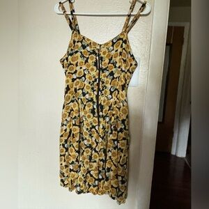 Size large Sunflower romper ( with pockets!!) great piece